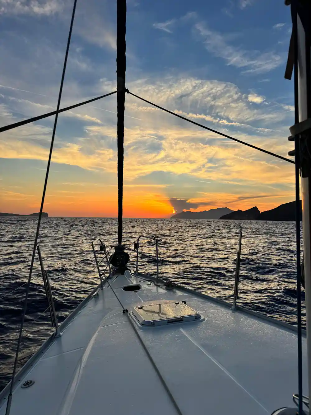 Sunrise over the sea seen from the foredeck